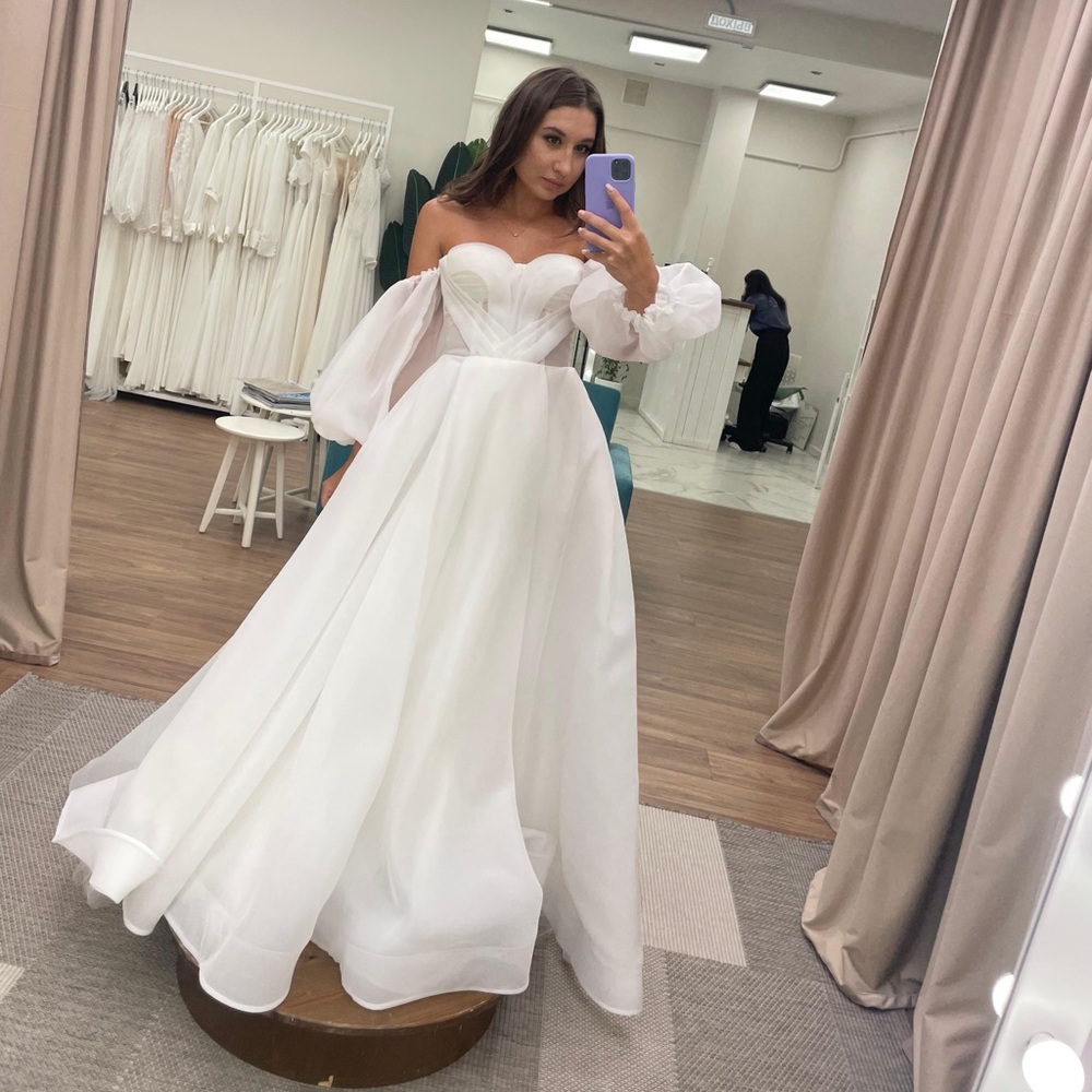 Romantic Off-Shoulder White Bridal Gown with Sheer Puff Sleeves